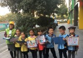 繪海報(bào)、走社區(qū) 杭州伢兒們挨家挨戶宣傳環(huán)保理念